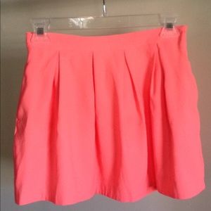 Girls size 11/12 coral colored skirt